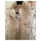 Ladies Faux Fur Coat by Worthington