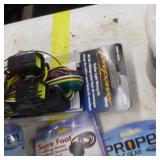 Anchor and Boat Accessories (in original packaging)  with Paddle Gear, Trolling Motor Switch, Trailer Wiring Kit, Adjustable Clamp On Rod Holder, Scupper Stoppers, and more