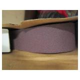 box of sand paper, a wheel, pully, ...