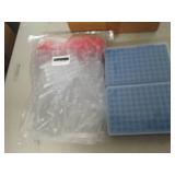 lot of glass tubes and trays ...