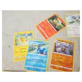 60 plus pokemon cards ...