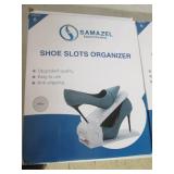 2 boxes of shoe slot organizers whi...