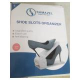 2 boxes of shoe slot organizers whi...