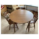 Round Wooden Table With Three Chairs