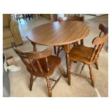 Round Wooden Table With Three Chairs