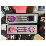 2 Dart Boards With Darts