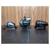 Lot of (4) Vintage Fishing Reels and Storage Case