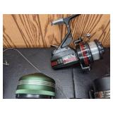 Lot of (4) Vintage Fishing Reels and Storage Case