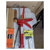 Assortment of Painting and Caulking Supplies