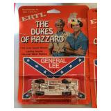 Mixed Lot of Collectable Toys, The Dukes of Hazard, Illco Toy Camera, & More