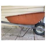 Metal Wheelbarrow Filled with Scrap Wood