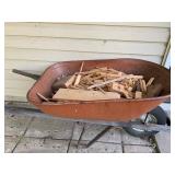 Metal Wheelbarrow Filled with Scrap Wood