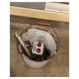 Bucket with miscellaneous items