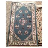 Two Rugs and One Framed Picture