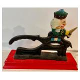 Magnificent Metal Nutcracker with a Wooden Base
