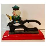 Magnificent Metal Nutcracker with a Wooden Base