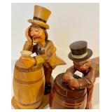 2 Carved Wood Barrel Men