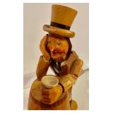 2 Carved Wood Barrel Men