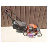 Troy Bilt electric start lawn mower. May need battery. Mower runs & works as it should. As shown.