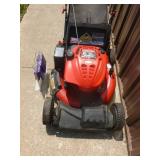 Troy Bilt electric start lawn mower. May need battery. Mower runs & works as it should. As shown.