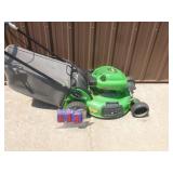 Lawn Boy 4 cycle lawn mower with bagger. Good running. Tested & works. As shown.