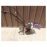 Earthquake 2 cycle mini tiller. Tested & works. As shown.
