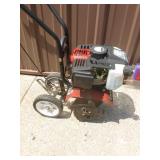 Earthquake 2 cycle mini tiller. Tested & works. As shown.