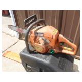 Husquevarna model 142 chain saw with case. Tested & works. As shown.