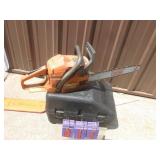 Husquevarna model 142 chain saw with case. Tested & works. As shown.