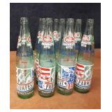 Lot of (12) Dr. Pepper 1976 Lake Crystal MN FarmFest Commemorative Soda Bottles