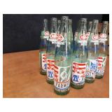 Lot of (12) Dr. Pepper 1976 Lake Crystal MN FarmFest Commemorative Soda Bottles