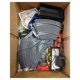 Pallet lot of Miscellaneous - Size 13 Nike Shoes, Electric Car Racetrack, Automotive Emergency Kit, Large Roll of Plastic Sheeting, Windshield Wipers (24", 26", and 28"), Misc. Tools, and More!