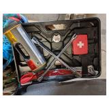 Pallet lot of Miscellaneous - Size 13 Nike Shoes, Electric Car Racetrack, Automotive Emergency Kit, Large Roll of Plastic Sheeting, Windshield Wipers (24", 26", and 28"), Misc. Tools, and More!