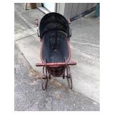vintage kids buggy with metal frame...