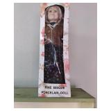 Fine Bisque porcelain doll in packa...