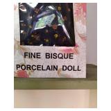 Fine Bisque porcelain doll in packa...