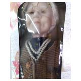 Fine Bisque porcelain doll in packa...