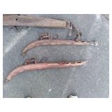 vintage tub full of farm implementa...