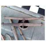 vintage tub full of farm implementa...