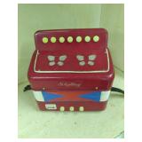 Vintage toy accordion, games, and c...
