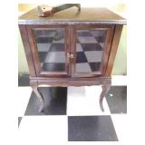 vintage cabinet, one leg is broken ...