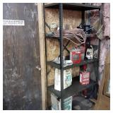 Tall metal storage shelf with misc ...