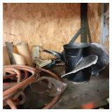 Tall metal storage shelf with misc ...
