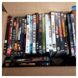 Box with a wide variety of DVD movi...