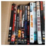 Box with a wide variety of DVD movi...