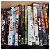 Box with a wide variety of DVD movi...