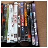 Box with a wide variety of DVD movi...