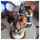 Box of Collectible figurines along ...