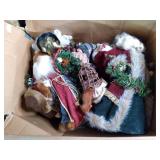 4 boxes of tree topper Santa