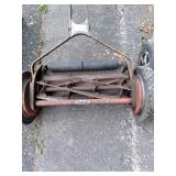 2 vintage push mowers...